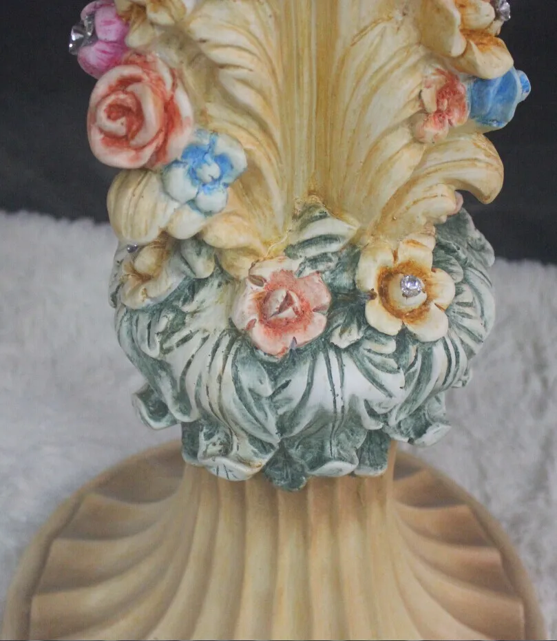 Flowers and plants telephone station. Phone. Flowers round a few. Flower. High tea table tables.