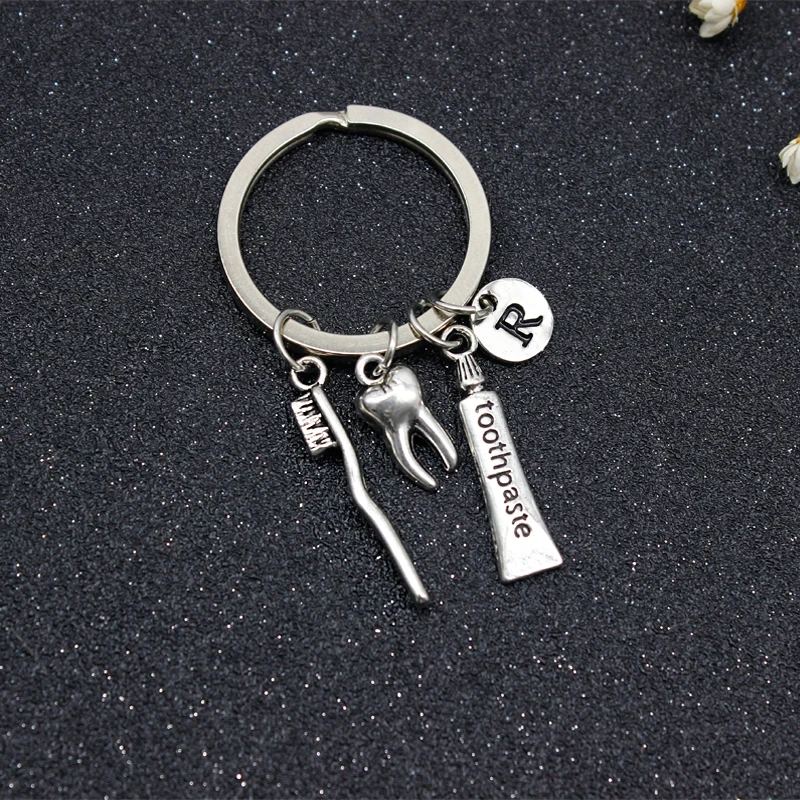

26 Letters Creative Personality Toothbrush Toothpaste Teeth Key Chain Protection Dental Health Dentist Gift Decoration Pendant