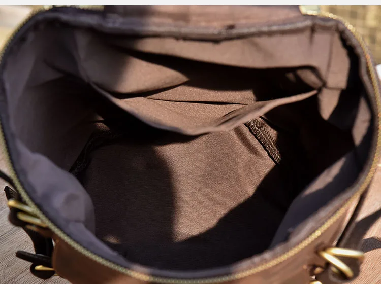 Capacity Display of Woosir Mens Vintage Genuine Leather Cylindrical Backpack