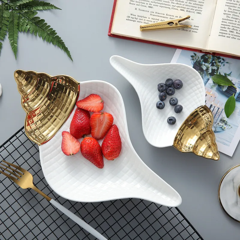 

Nordic Style Gold-plated Ceramic Fruit Plates Dessert Dish Candy Tray Simple and Creative Conch Shape Cosmetics Storage Tray