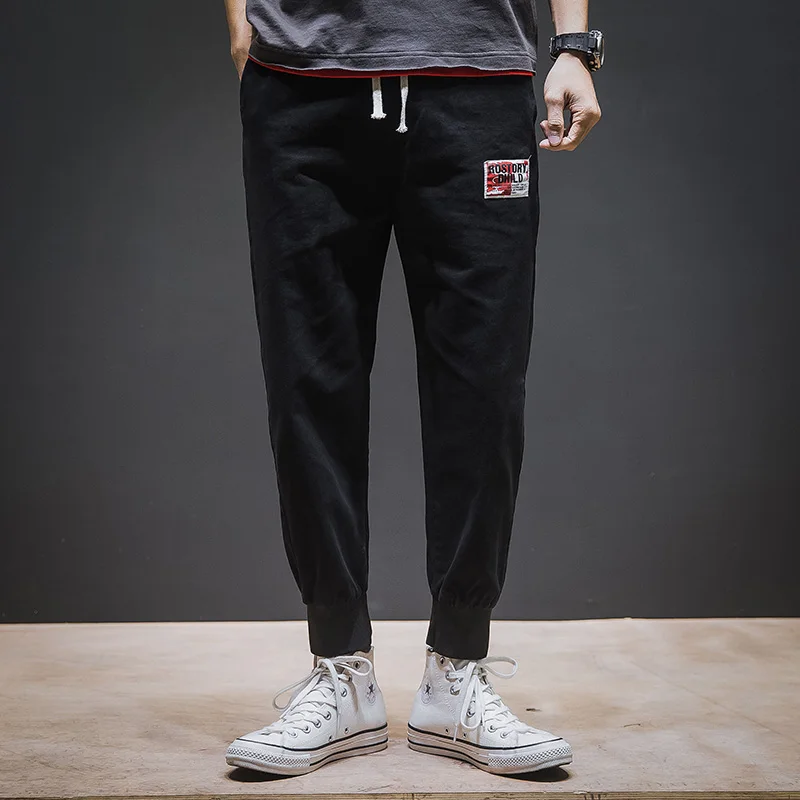 

Solid Color Man Joggers Casual Pants Elastic Waist Male Pants Patch Design Mens Sweatpants Joggers Trousers