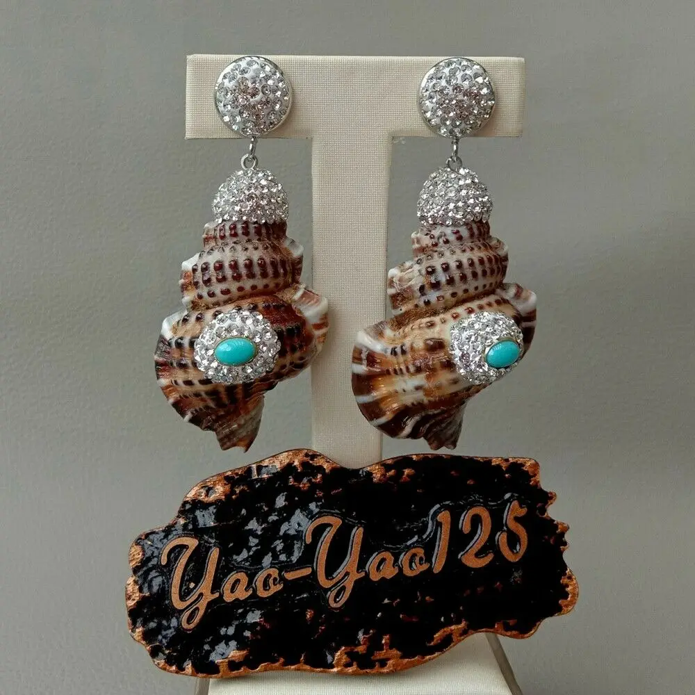 

Natural Fasciolaria Seashell Blue Stone Earrings