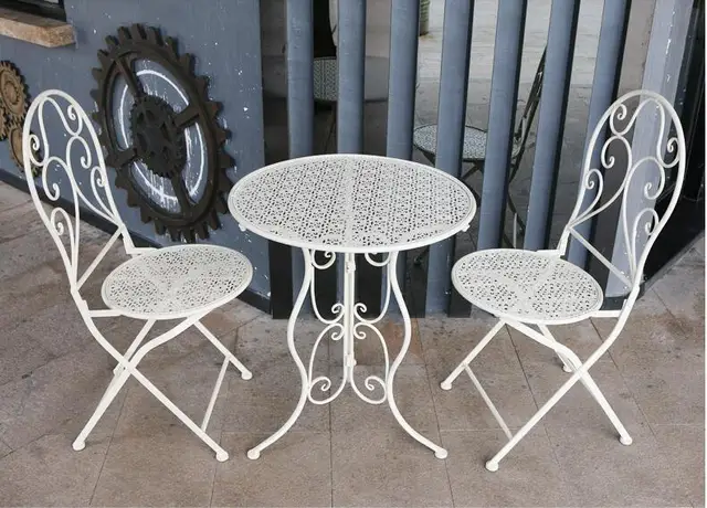 Best Price The balcony table and chair combination is simple recreational iron art folding hollow-out chair outdoor courtyard iron chair . Best Price The balcony table and chair combination is simple recreational iron art folding hollow-out chair outdoor courtyard iron chair .