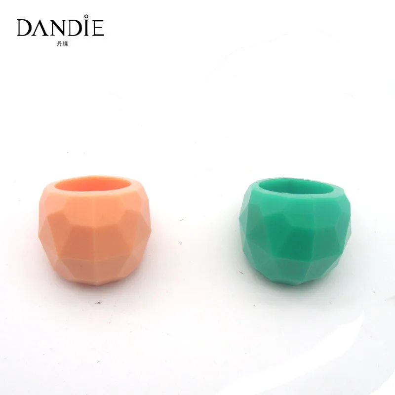 

Dandie Trendy Orange and Green Color Resin Finger Ring for Women