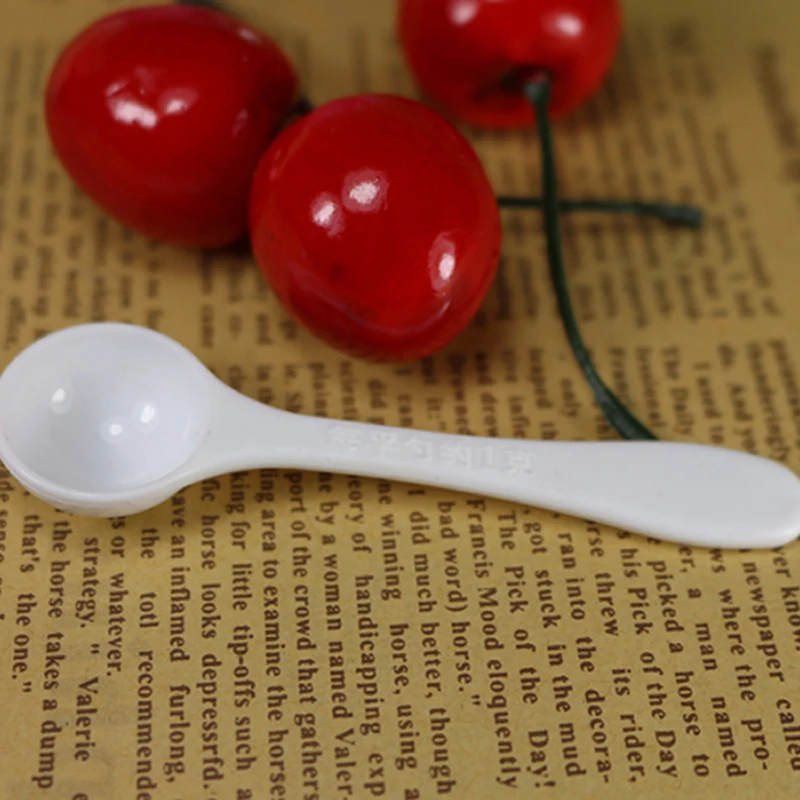 

Free Shipping 500pcs 1g Professional Plastic 1 Gram Scoops/Spoons For Food/Milk/Washing Powder/Medcine White Measuring Spoons