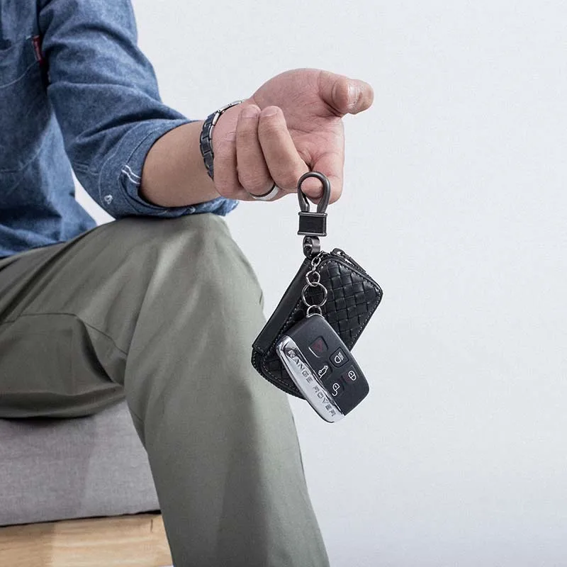 

Car key bag men's large-capacity first layer leather waist woven zipper key car key package