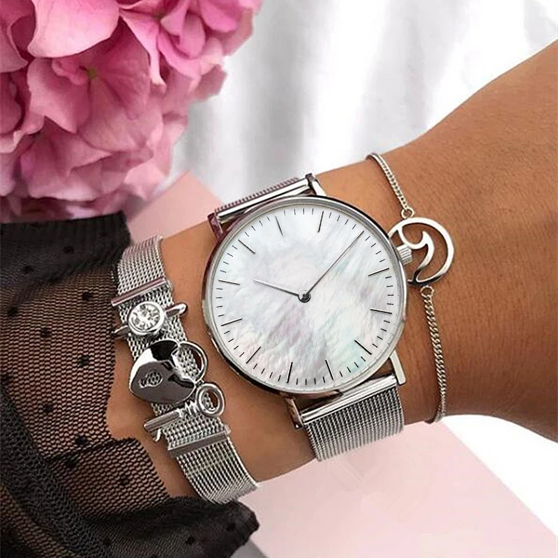 

Mavis Hare Silver Mesh Strap Lock & Key Story Mesh Bracelet Set with White Seashell Mesh Wrist Watches and Wave Chain Bracelet