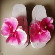 flip flops with big flowers on top
