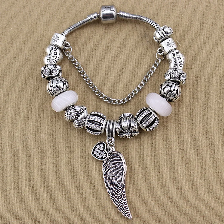 

European And American Fashion Love Wings Charm Bracelet Silver Plated Snake Bone Chain Female Pan Bracelet Gift.