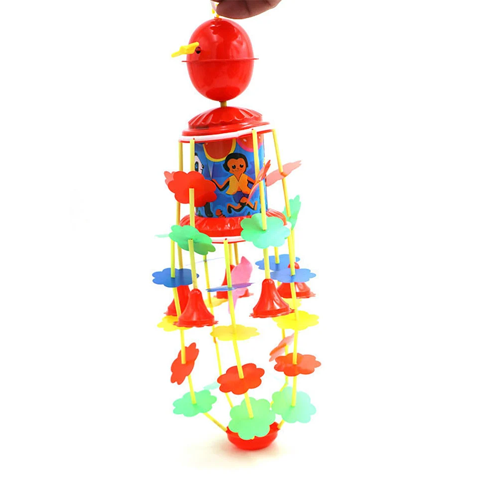 

Cartoon Developmental Baby Toys Clockwork Wind-up Bed Stroller Music Rotary Wind Chimes Rattles Bell Toys