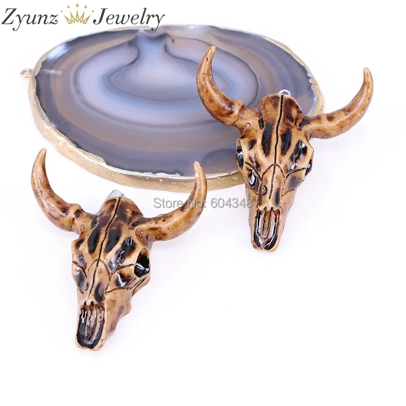 

10PCS ZYZ294-9503 Fashion buffalo Head pendant Bull head Cattle Bead Resin Horn Cattle Pendant for Jewelry Accessories