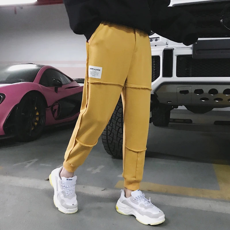 Fashion Casual Men's Feet Pants Spring And Autumn New M-2XL Solid Color Loose Nine Pants Four Colors PersonalityYouth Popular... Fashion Casual Men's Feet Pants Spring And Autumn New M-2XL Solid Color Loose Nine Pants Four Colors PersonalityYouth Popular...