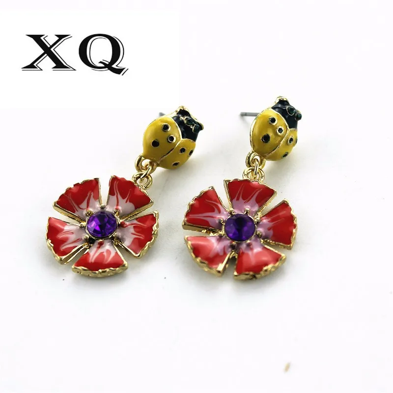 

XQ Free shipping 2015 Red flowers yellow Ladybug Earrings The new popular banquet texture
