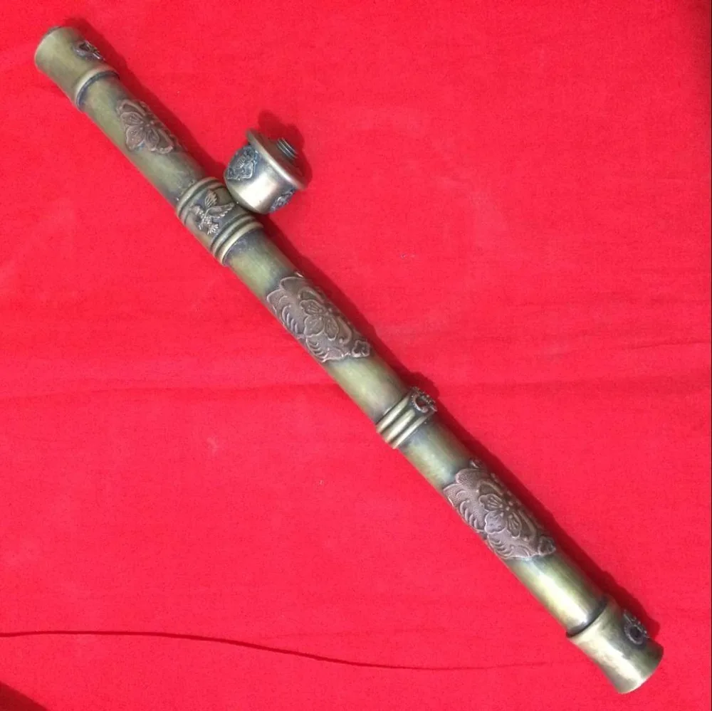 

antique The ancient Chinese pipe with decorative pattern