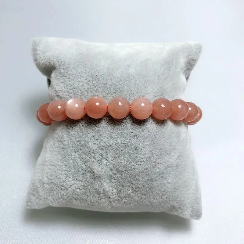 

This has a sun-stone bracelet with a size of 15mm Men and women can wear