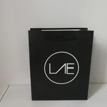 Черный роскошный бутик матовая ламинированная сумка-шопер роскошный для бумаг хозяйственная сумка с хлопковой ручкой печать логотип для подарочной упаковки выставка