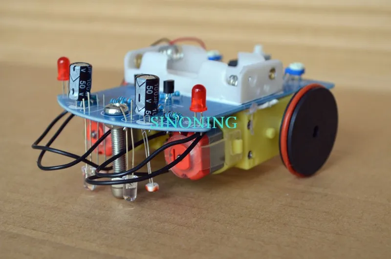 

Cheap D2-1 Smart Robot Car kits tracking car photosensitive robot kits parts for DIY electric toy no battery