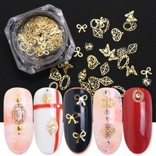 1 коробка полый сплав для дизайна ногтей металлические украшения для ногтей 3D Золотые украшения Подвески Стразы Бабочка венок Овальный бант аксессуары BE967
