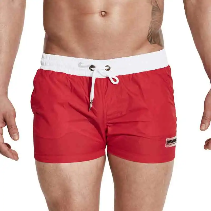 Мужские купальные шорты плавки для мужчин пляжные бермуды для серфинга Плавки нейлоновые быстросохнущие спортивные штаны для бега сетчатая юбка - Цвет: S601 Red