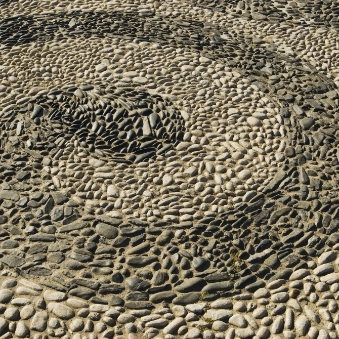 Pattern Made Of Stones In Pavement Poster Print (17 x 11)