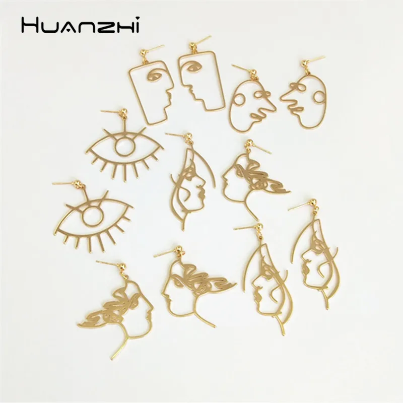 

HUANZHI Hollow Gold Color Metal Alloy Line Human Face Eyes Geometric Design Long Drop Earrings for Women Party Jewelry Gifts