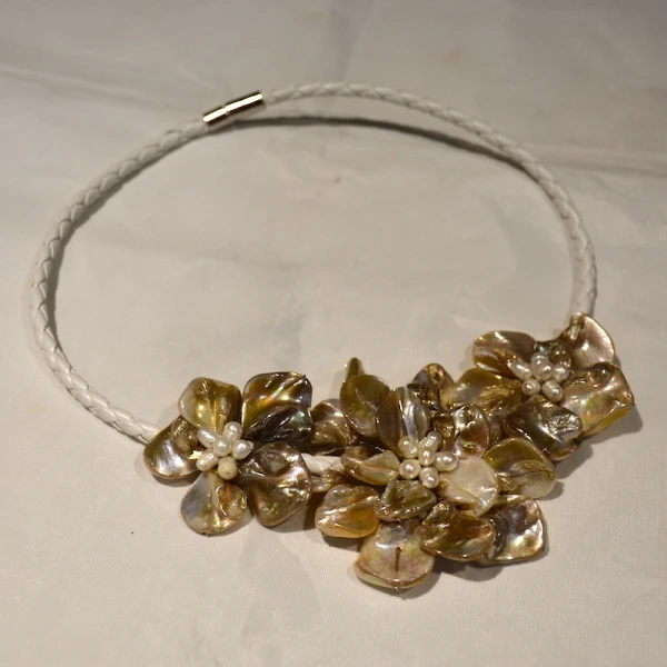 

Mother of pearl jewelry shell flower necklace with white leather