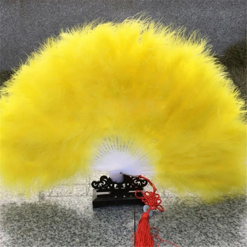 

Factory Direct Sales High Quality yellow Folded Turkey Feather Hand Fan Wholesale Handmade Fans for Dance Wedding Decoration