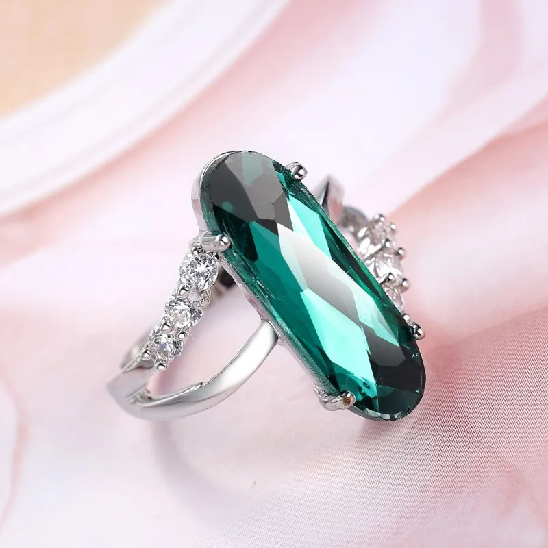 

2019 New European New Explosive oval zircon ring Female Crystal from Swarovski Simple Temperament 2 Colors Green and purple