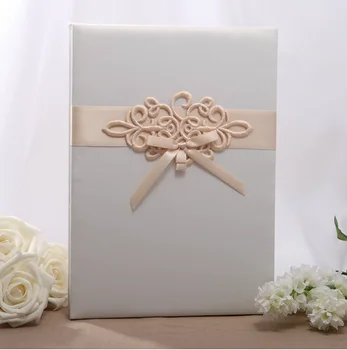 

Ivory Color Wedding Guest Signature Book with Champagne Embroidered Bow