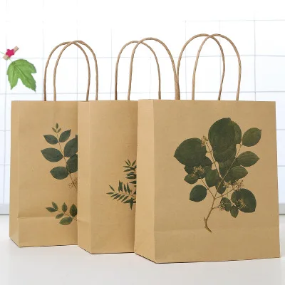 2018 wholesale 500pcs/lot cheap 120g brown kraft paper shopping bags custom printed company logo ...