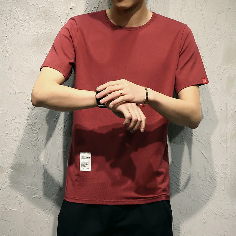

2018 hollow new men's high street hip hop fashion round neck solid color tide personality hem short-sleeved T-shirt