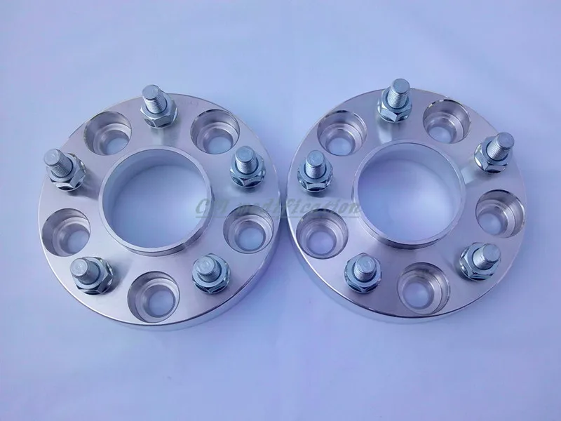 A pair of (2), 5 x4 5 (114.3 mm), hole is 60.1 mm, wheel adapters