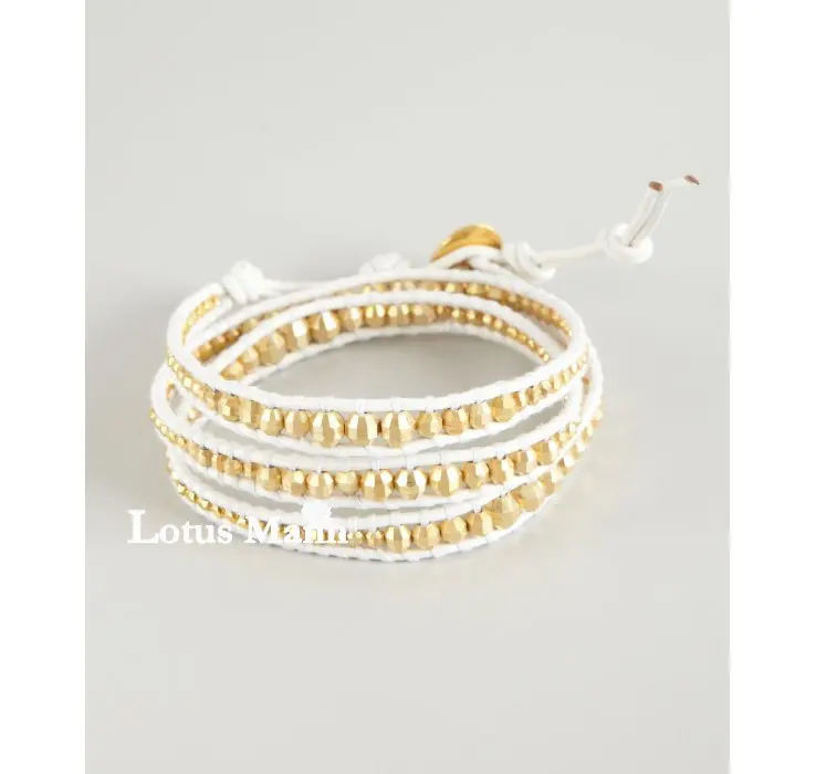 

Lotus mann Gold Vermeil Wrap Bracelet on White Leather