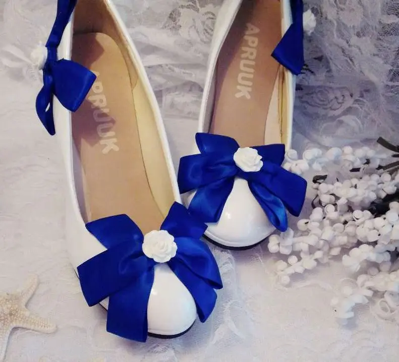 white shoes with blue butterflies