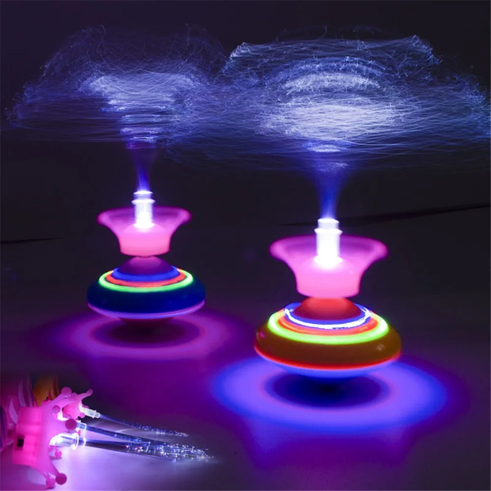 

Novelty Light Fiber Spinning Top Laser Music Luminous Music Gyro Light Up Kid Toy Random delivery