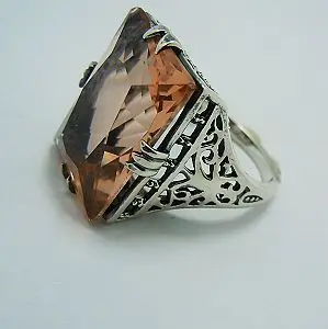 

Delivery is free shipping custom processing wholesale and retail of Victorian gem ring carved hollow out champagne