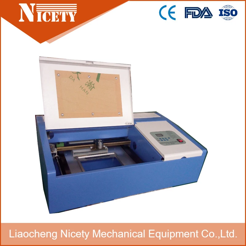 50w CO2 mini laser engraving machine 320 for cutting paper,engraving rubber stampmachine