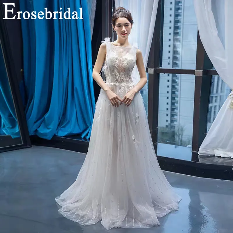 

Erosebridal New Arrival 2019 Scoop Wedding Dresses Feathers Wedding Gown Tulle Bride Dress Sleeveless Women Dress White Dress