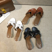 

The leather is rough with the outdoor slippers, the female summer fashion 2018.