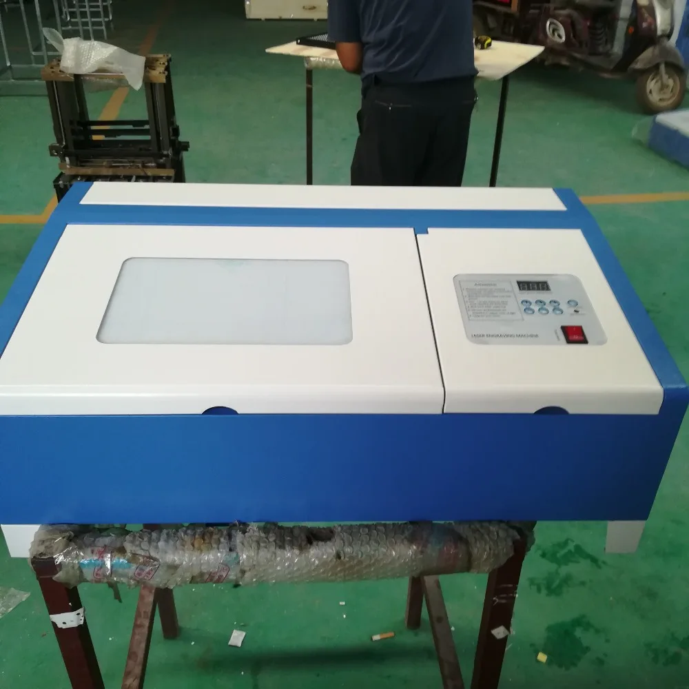 

40W 3020 CO2 laser engraivng machine with up and down table and air