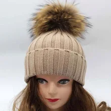 Модный бренд Дизайн из натурального меха енота пом Англичане шапка теплая Зимняя шерстяная одежда Трикотажные Промашка Шапки для Для мужчин и Для женщин
