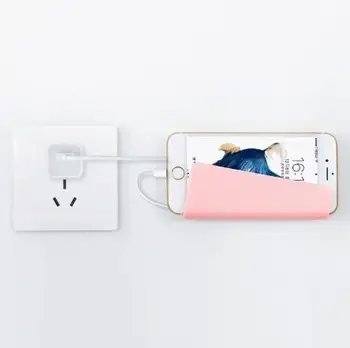 

Hot Sell Mobile phone charging bracket wall mobile phone frame frosted seamless adhesive wall mount charging rack