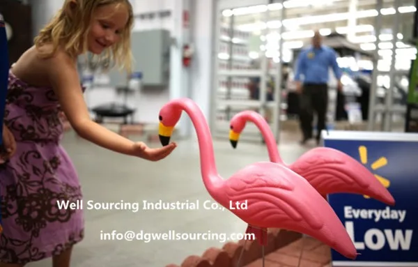 Plastic pink flamingo lawn ornament (2)