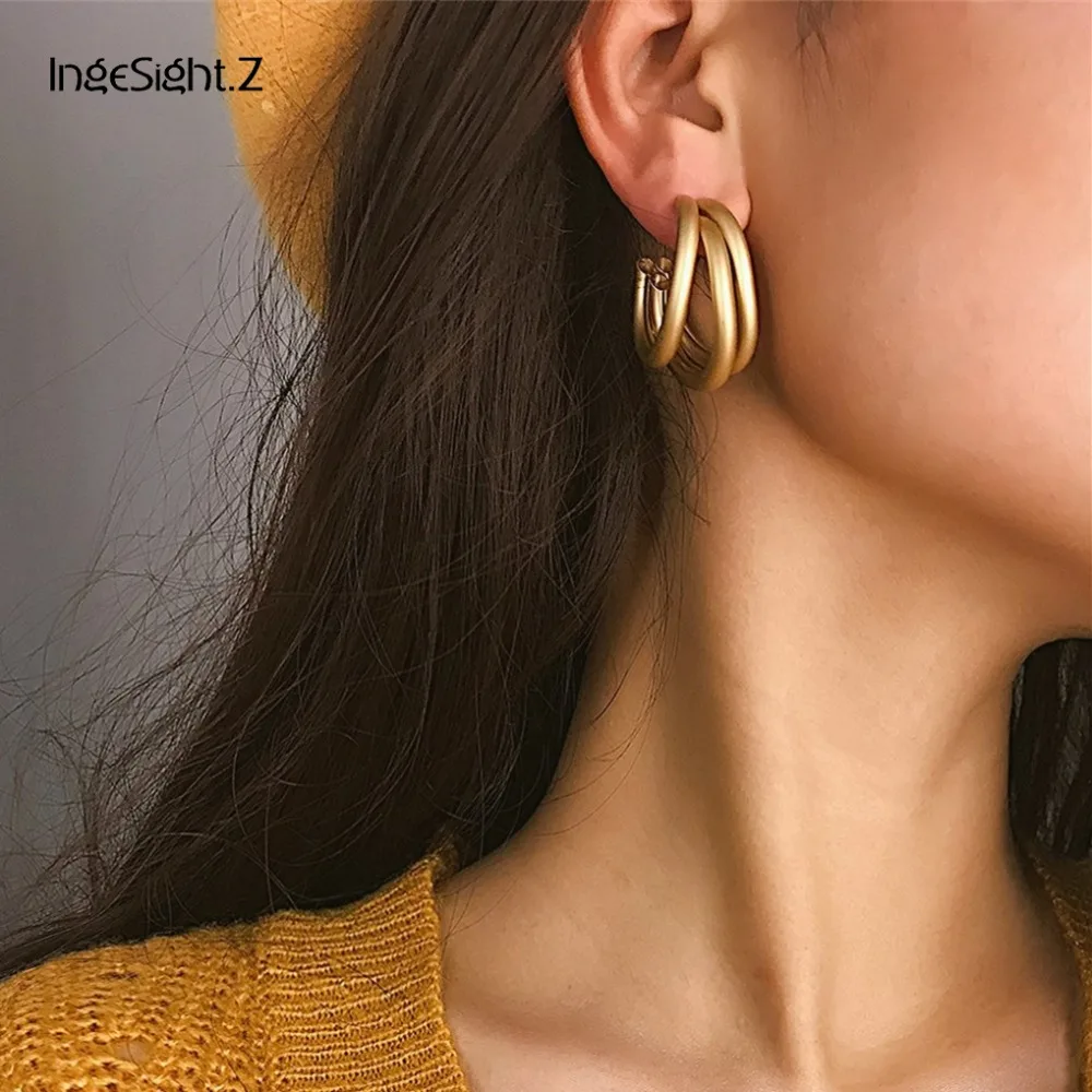 

IngeSight.Z Punk Matte Gold Geometric Twisted Curved Cross Round Circle Stud Earrings for Statement Women Jewelry Gifts Brincos