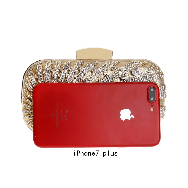 Luxy Moon verzierte goldene Clutch. Vergleichen Sie mit dem iPhone