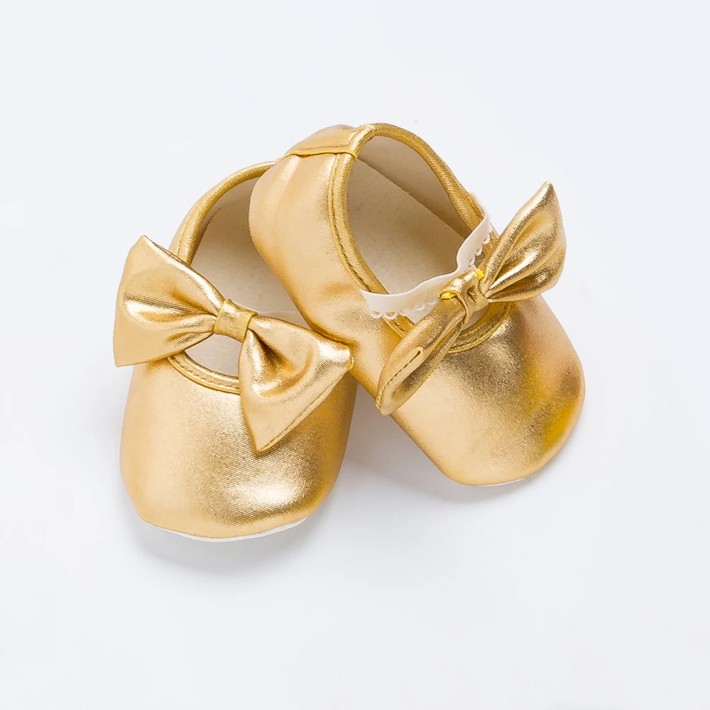 gold newborn shoes