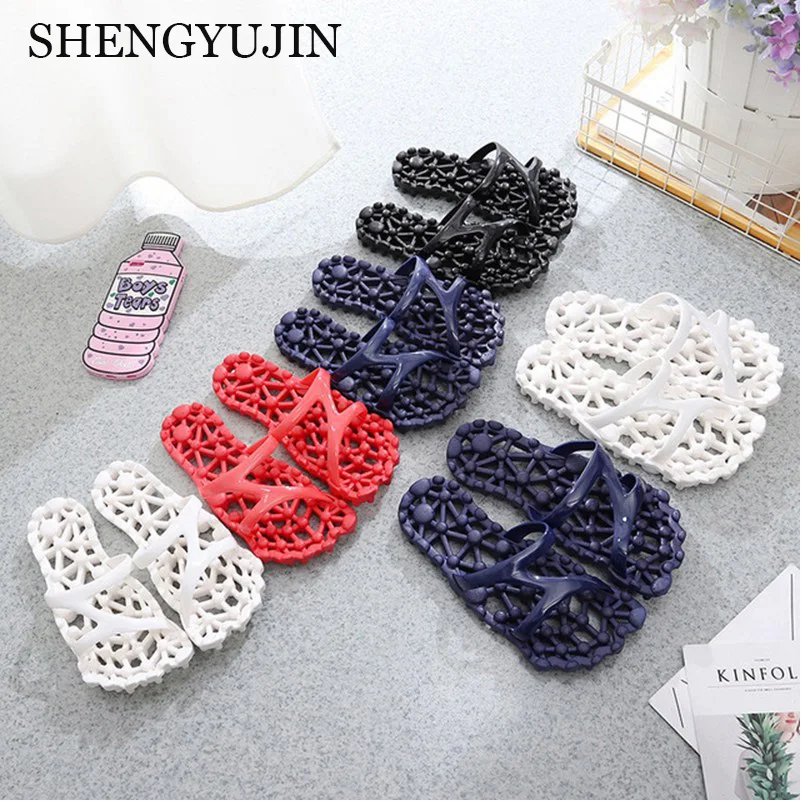 

Men and women slippers summer couple home acupressure massage slippers fashion soft hole leaking anti-slip sandals and slippers