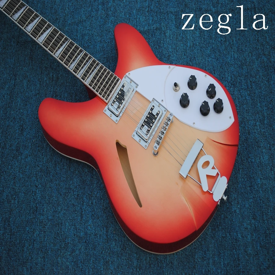 

39-inch 12-string guitar, Rickenback 360 electric guitar, with two outputs, lacquered sheen on the mahogany fingerboard.