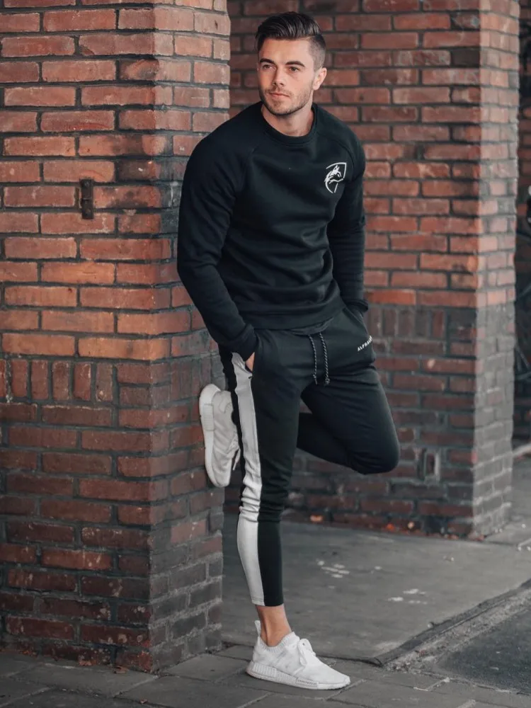 Alphalete رجل ركض سراويل تقليدية اللياقة البدنية الرجال الرياضية رياضية القيعان نحيل Sweatpants السراويل صالات رياضية عداء ببطء السراويل الترنك
