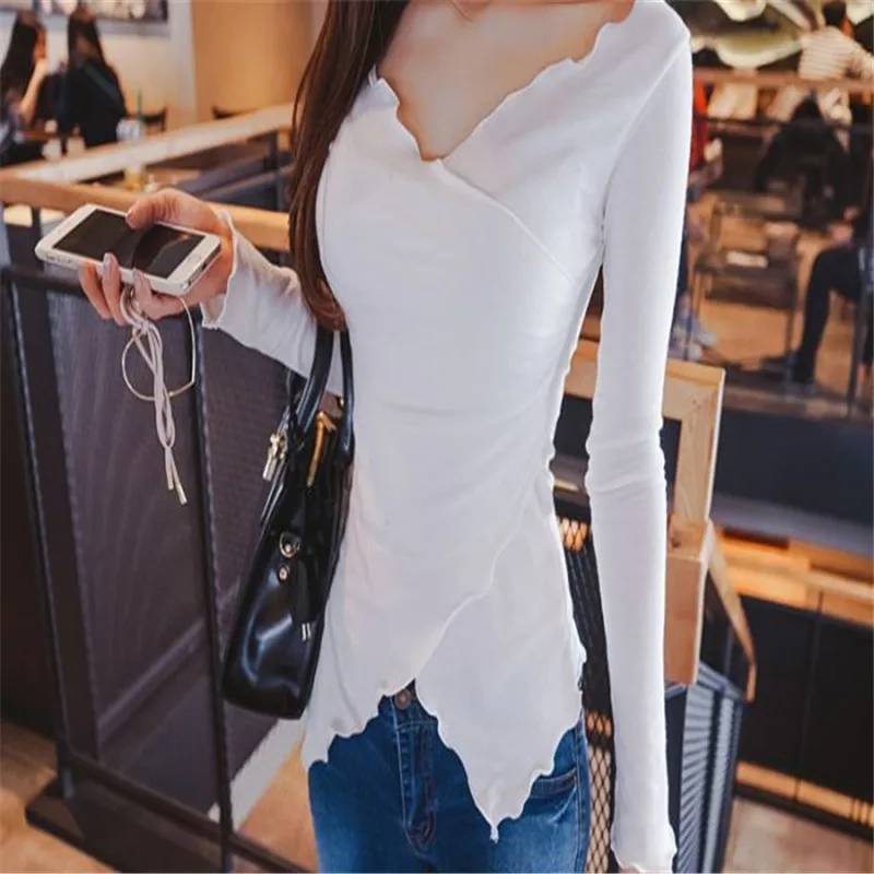 

A new summer 2019 ivory white slim fit shirt with a large v-neck and long sleeves with a split ear-edge base shirt